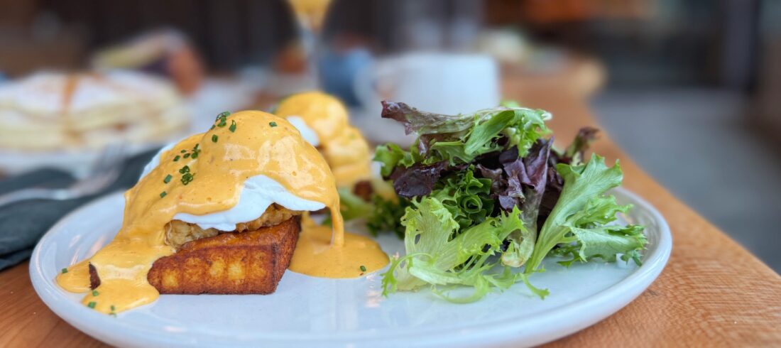 Dungeness eggs benedict from Sweet Waters on the River at Valley River Inn in Eugene, Oregon. 