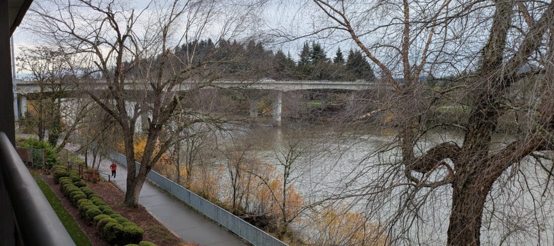 Patio view of the Willamette River and Ruth Bascom Riverbank Path System at Valley River Inn in Eugene, Oregon. 